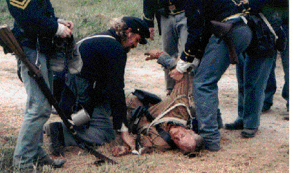 Dead Confederate Trooper being stripped of valuables, Greenville, IL 1999